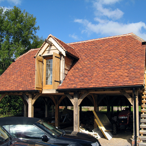 Tudor clay roof tiles available from About Roofing Supplies